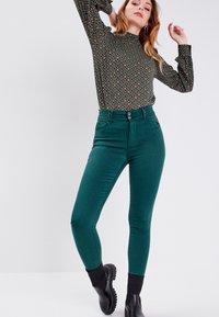 Cache Cache Jeans Skinny - vert foncé - ZALANDO.FR