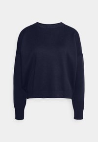 Maglione lavorato a maglia di colore blu navy con scollatura rotonda, spalle scese e polsini e orlo a costine. Tessuto morbido, vestibilità comoda.