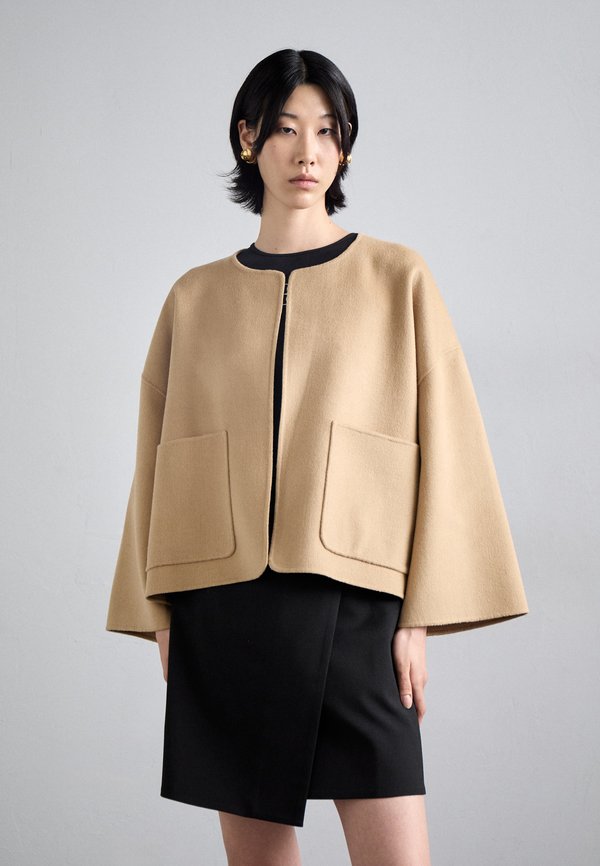 JACQUIE - Light jacket - dark sand