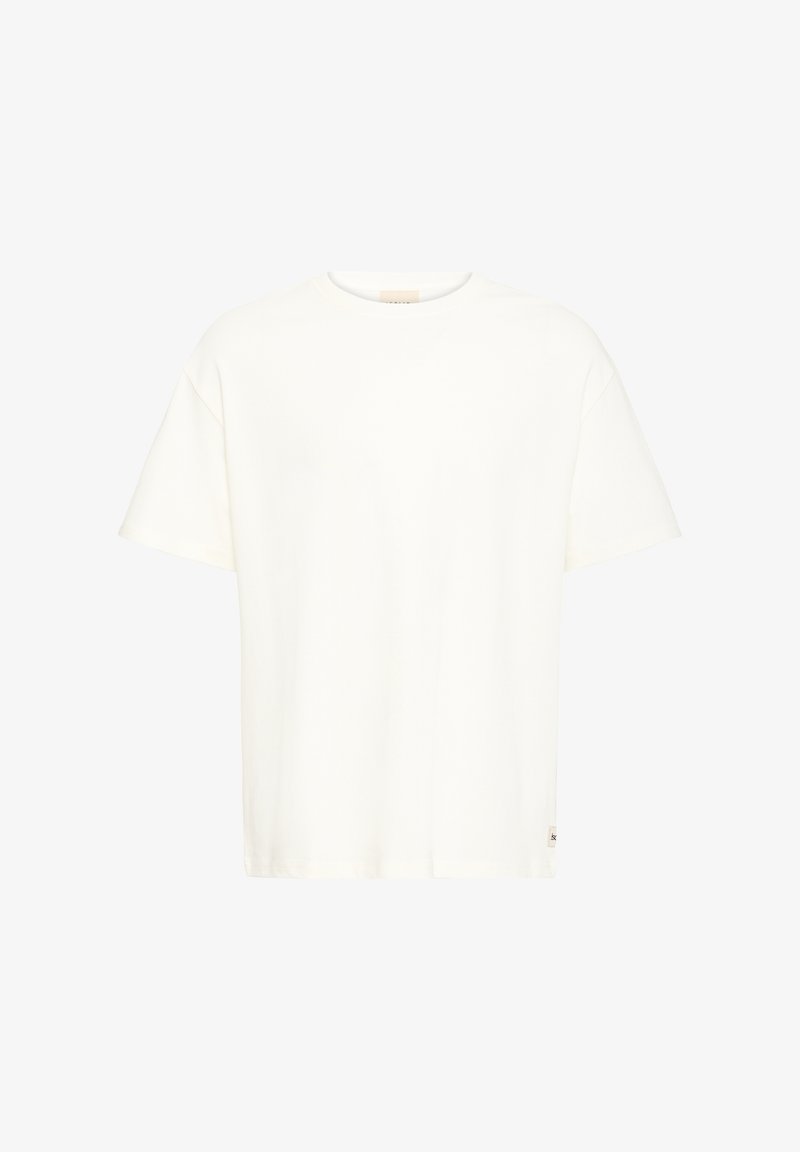 T-shirt blanc uni à manches courtes et col rond avec une petite étiquette en tissu sur la couture latérale inférieure, présenté de face.