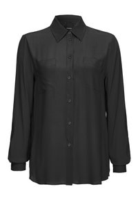 Camicia nera con bottoni realizzata in tessuto morbido. Presenta due tasche frontali, maniche lunghe e un colletto classico.