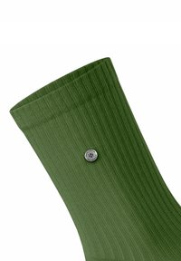 Prążkowana zielona skarpetka z metalowym guzikiem z detalem logo. Skarpetka ma teksturowane wykończenie i fason sięgający do połowy łydki.