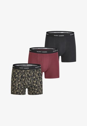 Drie paar boxers: één effen zwart, één effen bordeauxrood en één met een bloemenpatroon op een zwarte achtergrond; elastische "HAPPY SHORTS" tailleband.