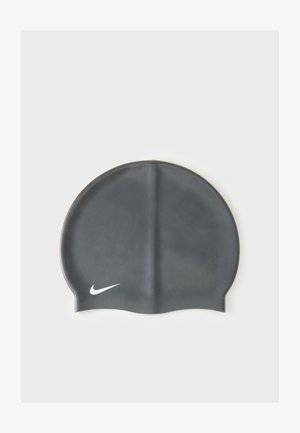 Bonnet de bain en silicone noir avec une crête centrale surélevée et un logo Nike blanc en bas à gauche.