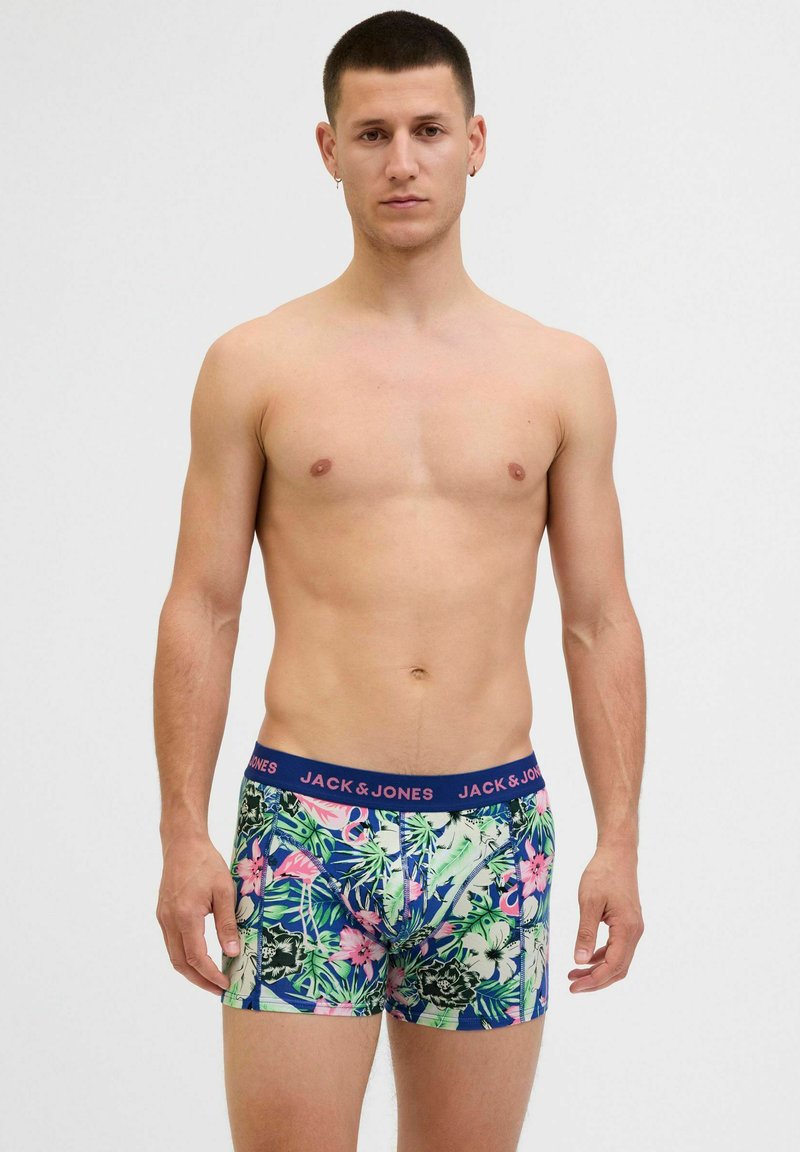 Boxershorts mit einem bunten tropischen Print und pinken sowie grünen Blumenmustern. Elastischer marineblauer Bund mit "JACK & JONES"-Markierung.