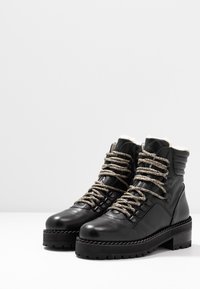 The Kooples Stivaletti con plateau - black