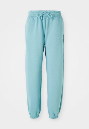 Light blue sweatpants made of soft fabric with an elastic waistband, drawstring detail, and elastic cuffs at the ankles. Small logo on side.