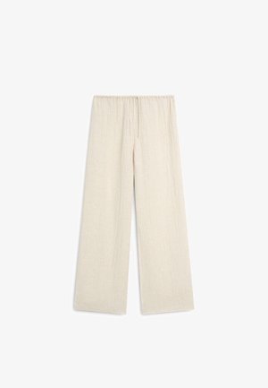 Beige broek met wijde pijpen, elastische tailleband en trekkoord, gemaakt van lichtgewicht gestructureerde stof.