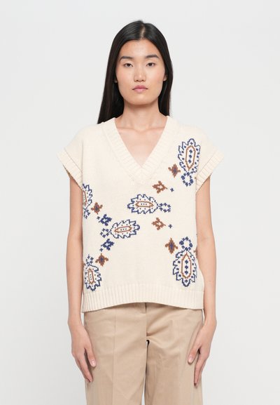 Knit beige sweater with short sleeves, V-neck, and floral embroidery in blue and brown patterns. Ribbed hem detail.