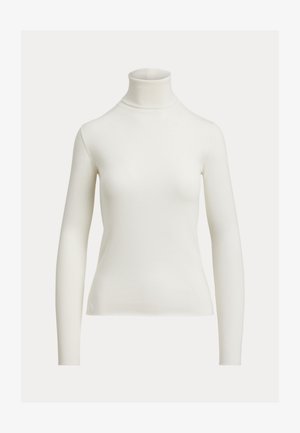 Pika varrukaga, helevalge soonikkoega kõrge kaelusega kampsun, mis on keha järgi lõigatud ja ühtlase taustaga.