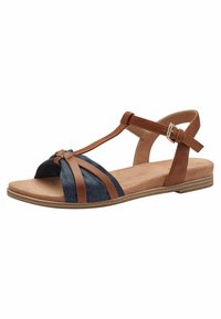 I sandali T-strap marroni e blu navy presentano un design annodato, un materiale simile alla pelle scamosciata, cinturini in pelle liscia e una suola piatta in gomma.