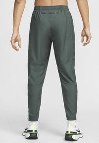 Nike Performance PANT - Trainingsbroek - vintage green black