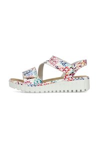 Sandales colorées avec une semelle plate-forme blanche, présentant un motif floral texturé dans des tons de rouge, bleu et orange sur les brides supérieures.