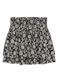 Jupe noire avec motif floral blanc, taille élastique froncée et ourlet à volants superposés.