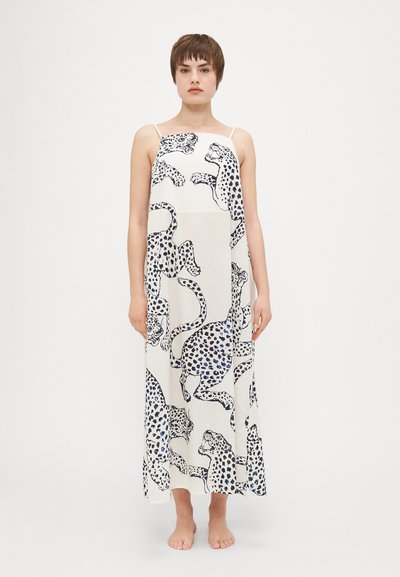 Abito maxi bianco con una stampa leopardata nera e blu, dotato di spalline sottili e una forma ampia e fluida. Tessuto dal tocco morbido.