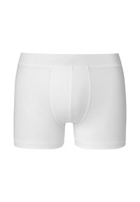 White cotton boxer shorts featuring a fitted design, elastic waistband, and a smooth texture with minimal stitching details.