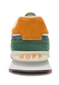 Suede sneaker featuring orange, green, and blue panels, cream accents, and an orange "HOFF" logo on the heel, with a rubber sole.