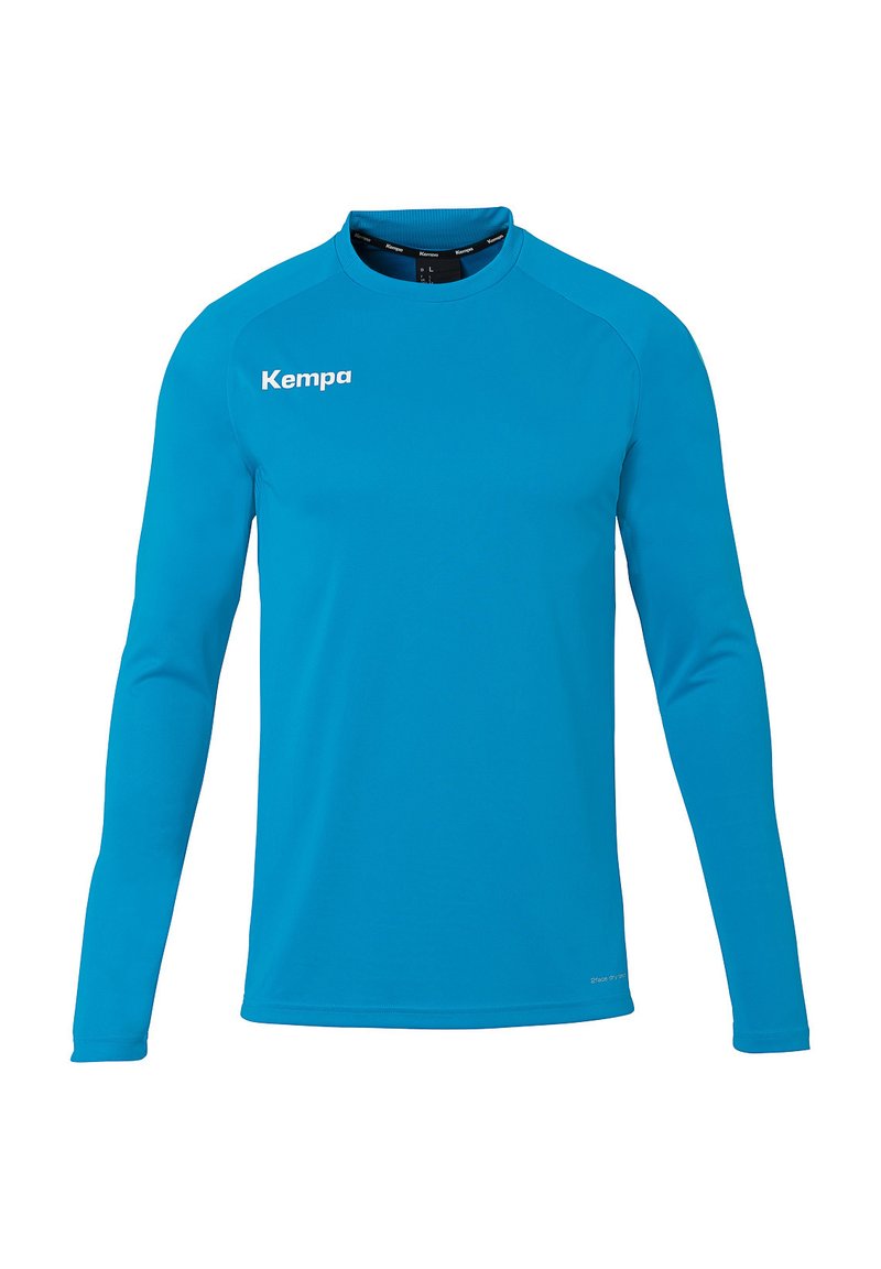 T-shirt de sport à manches longues en tissu bleu lisse, avec un col rond et un logo "Kempa" blanc bien visible à l'avant.