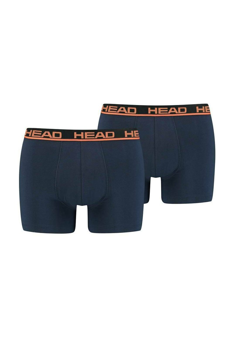 Dunkelblaue Boxer-Shorts aus weichem Stoff, mit einem schwarzen elastischen Bund, auf dem "HEAD" in Orange gedruckt ist. Zwei Paare sind ausgestellt.