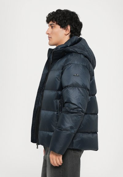 Dunkelblauer gepolsterter Jacke mit Kapuze, mit Reißverschluss und Seitentaschen. Aus glänzendem Nylon gefertigt, mit gestepptem Muster.