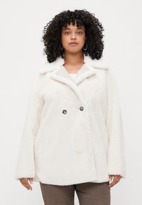 Cream-colored, faux fur coat with a notched collar, double-breasted button closure, and wide sleeves. Soft texture and relaxed fit.