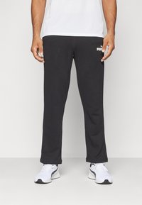 Puma - LOGO PANTS - Jogginghose - black Thumbnail-Bild 1