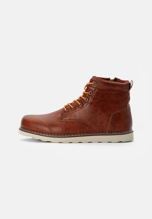 Stivaletti stringati - cognac