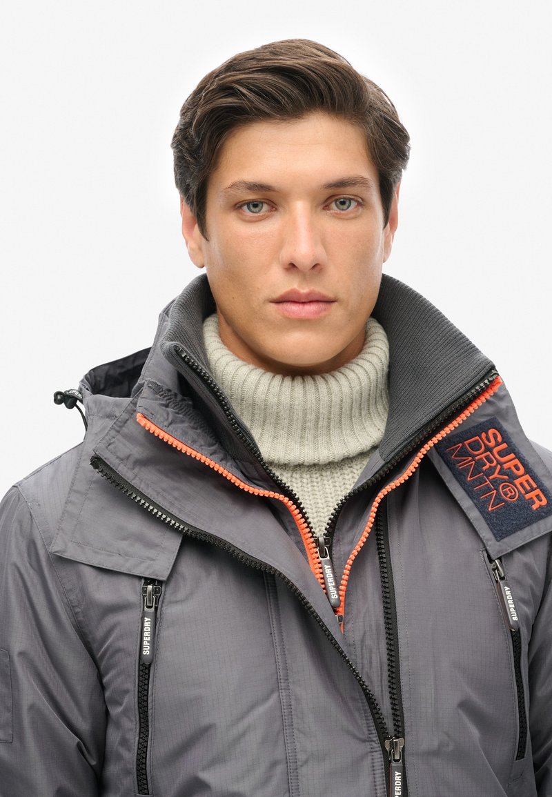 Veste Coupe-vent Superdry Homme Bleu XL Capuche Poches Zip