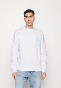 Calvin Klein Jeans STACKED OUTLINE CREWNECK - Sweatshirt - bright white