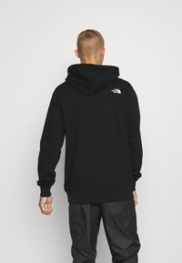 The North Face ZUMU HOODIE - Sportska majica - black