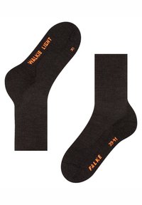 Meias pretas com superfície texturizada. Apresentam letras laranja "WALKE LIGHT", "FALKE" e o tamanho "39-41" nas laterais. Incluem detalhes emborrachados.