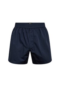 Námořnické modré boxerky s vertikálními bílými pruhy, vybavené elastickým pasem s embosovaným logem, vyrobené z lehké látky.