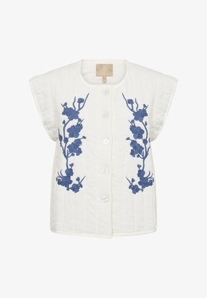 Balts quiltēts veste ar zilu ziedu izšuvumu, ar apaļu kakla izgriezumu, īsām piedurknēm un pieciem pogām priekšpusē.