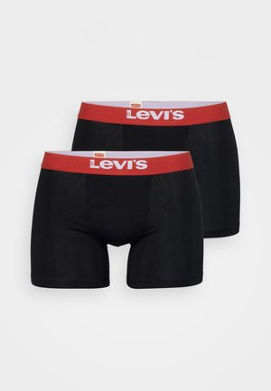 Boxer neri con un cinturino rosso Levi's, caratterizzati da una vestibilità aderente e una texture liscia, adatti per un uso quotidiano.