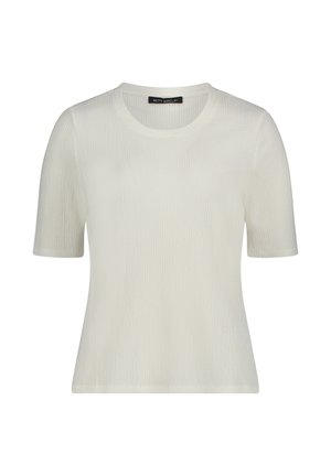 Haut blanc en maille texturée à manches courtes avec un col rond et une silhouette ajustée.