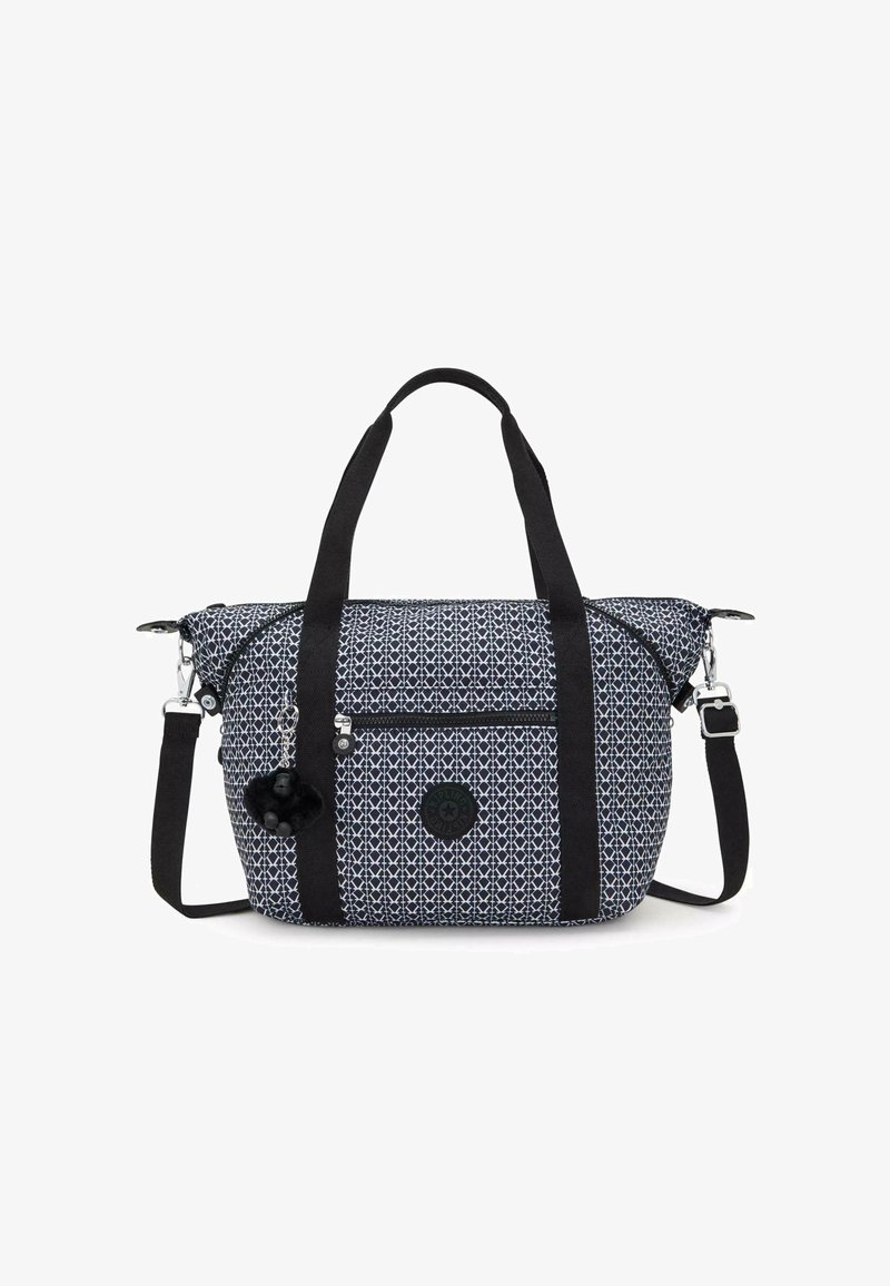 Sac à motifs bleus avec des poignées noires, poche zippée et un logo rond. Comprend un accessoire pom-pom détachable. Fabriqué en tissu durable.