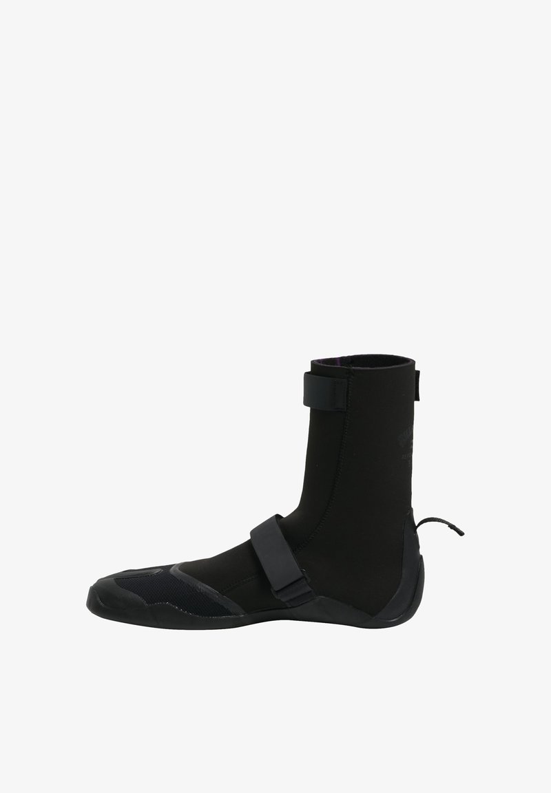 Neoprene boot in black with a fitted design, featuring a strap across the ankle for security, and textured sole for grip.