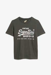 Mørkegrå bomulds T-shirt med rund halsudskæring. Features "Vintage SuperDry" grafik i iriserende skrifttype og hvide tekst accenter.