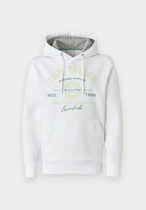 Vit hoodie gjord av mjukt tyg med en framficka, med en gråfodrad huva och tryckt logotyp i grön och svart.