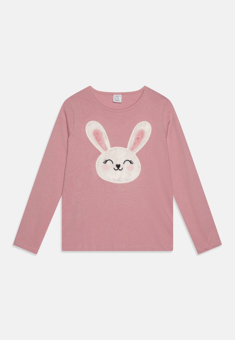 Roza majica z dolgimi rokavi, ki je okrašena z teksturirano belo grafiko zajčka z roza notranjimi ušesi ter črnimi šivi za oči in usta.