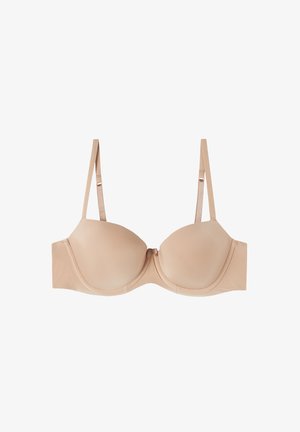 Beige geformter BH mit verstellbaren Trägern. Glattes Material, Stütze mit Bügeln und nahtlose Schalen. Einfaches Design ohne zusätzliche Muster oder Akzente.