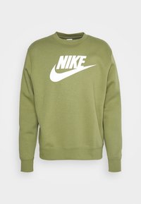 Olivgrön sweatshirt tillverkad av mjukt tyg, med en stor vit Nike-logga över bröstet samt ribbade muddar och nederkant.