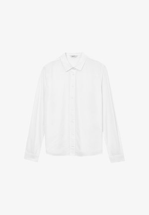 Chemise blanche à manches longues avec col, sept boutons sur le devant et poignets boutonnés, présentée sur fond blanc.
