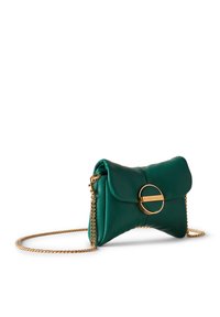 Green leather handbag with a folded design, featuring a gold circular hardware accent and a chain strap. Smooth texture and minimalistic style.