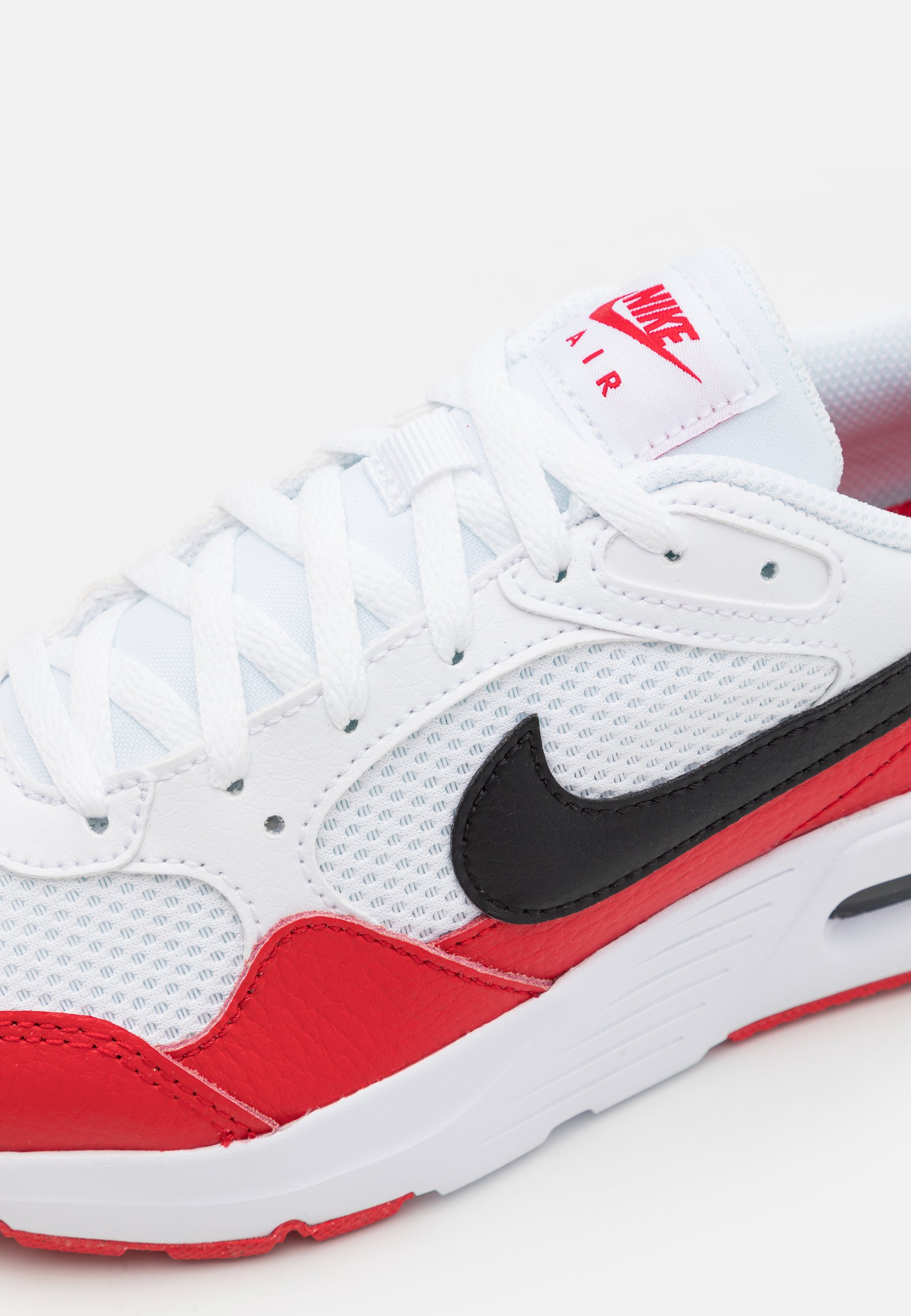 red white nike trainers