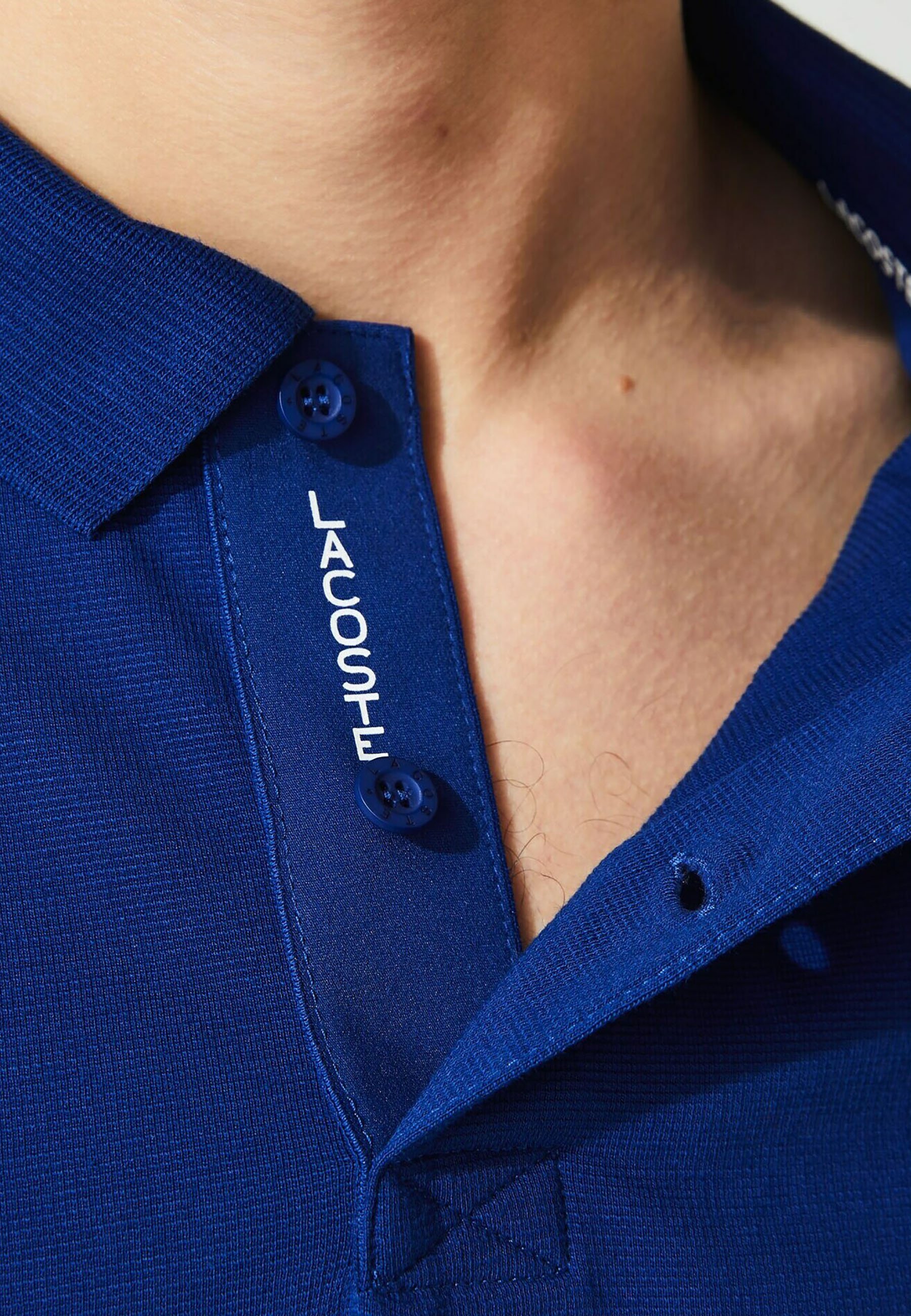 Polo Lacoste SPORT en piqué respirant bicolore avec marquage – Achat pas  cher - GO Sport