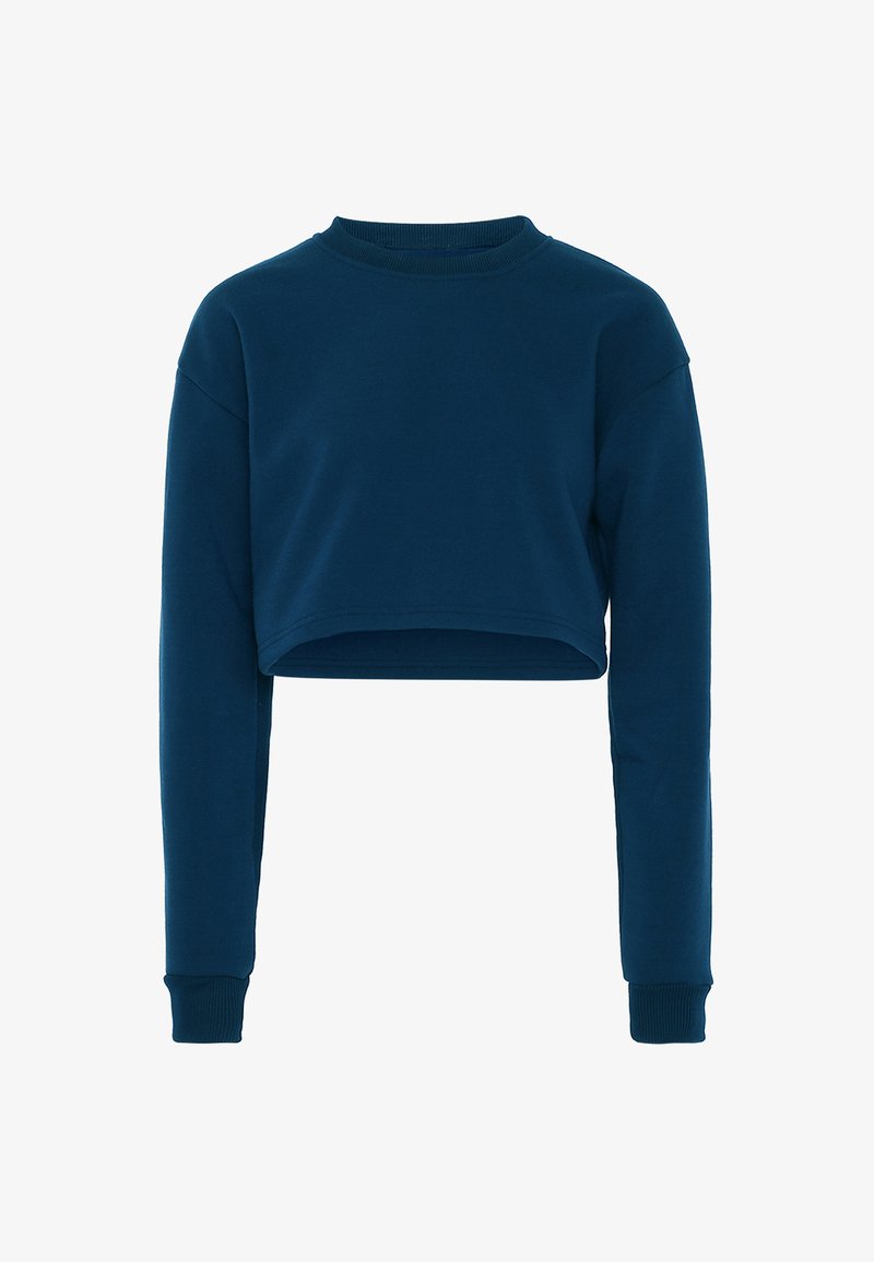 Pullover accorciato di colore blu scuro, realizzato in morbido misto cotone. Presenta maniche lunghe e polsini a coste con scollatura tonda. Texture liscia.
