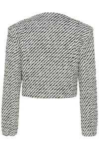 Kort jacka i svart och vitt houndstooth-mönster; textilstruktur; långa ärmar; rundad halsringning; bakvy.