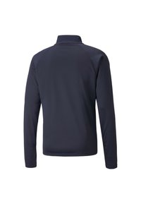 Giacca a maniche lunghe blu navy con colletto alto, realizzata in un tessuto leggero e liscio, dotata di maniche raglan per un'agevole libertà di movimento.