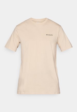 Beige kortermet t-skjorte laget av bomull, med en liten svart Columbia-logo på venstre bryst. Standard rund halsdesign.